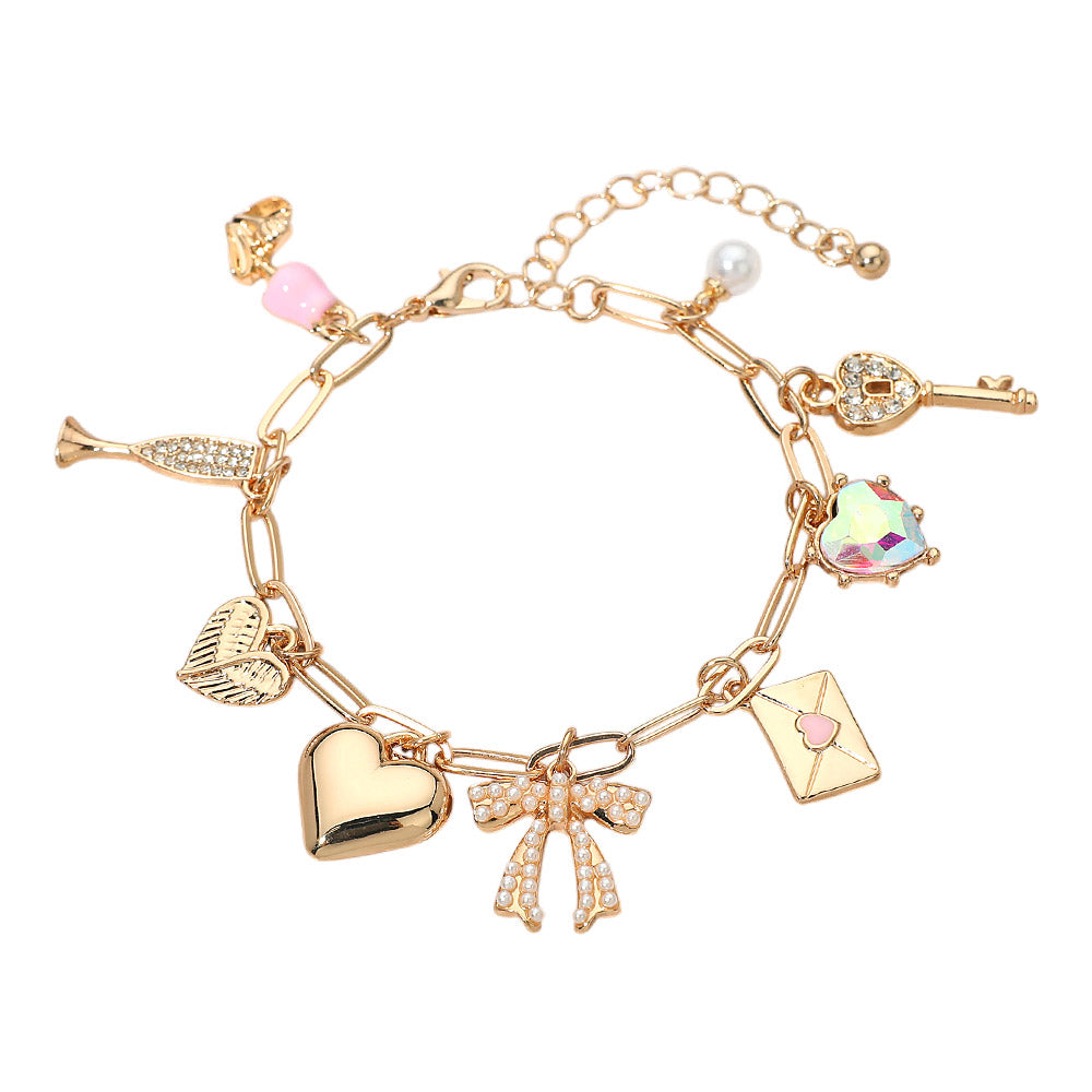 Gold charm bracelet heart, bow, key