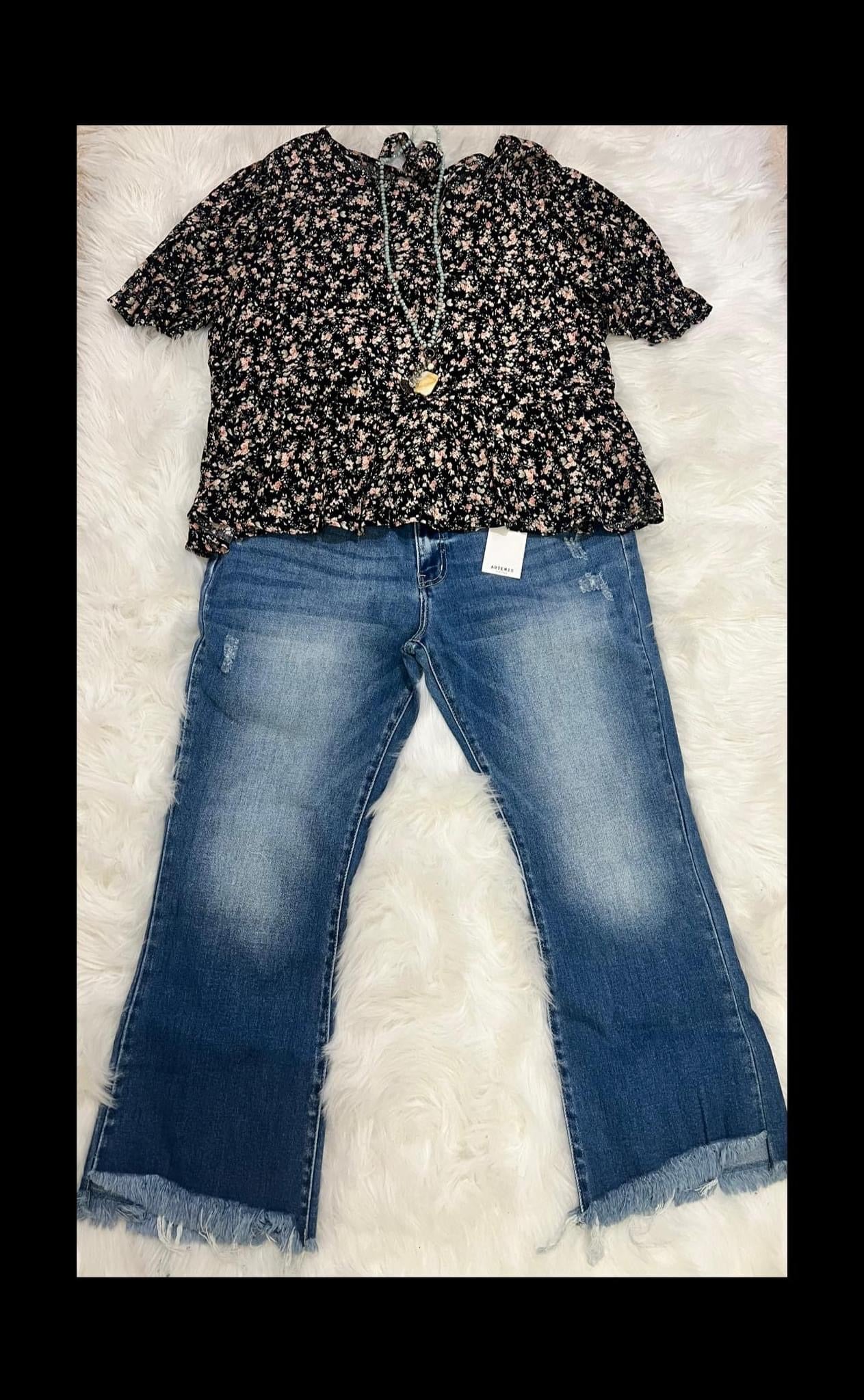 Black floral blouse with cutout and bows in back