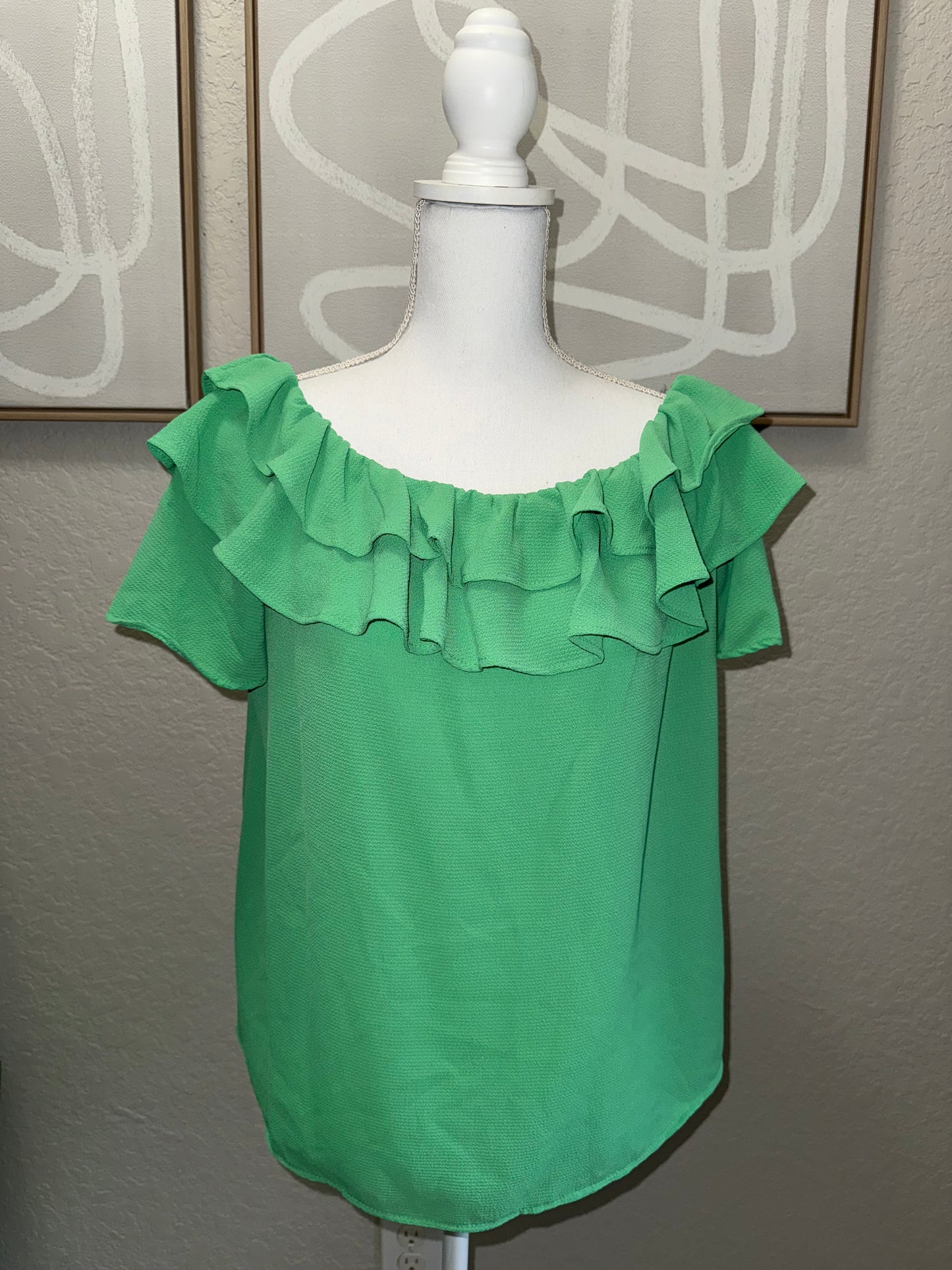 Green ruffle blouse