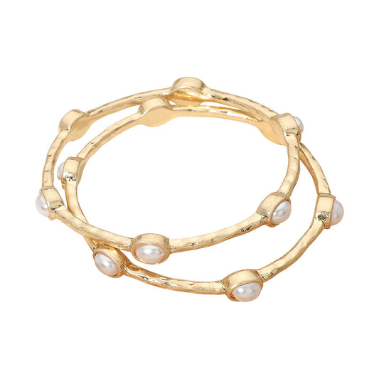 Faux pearl gold bracelet set