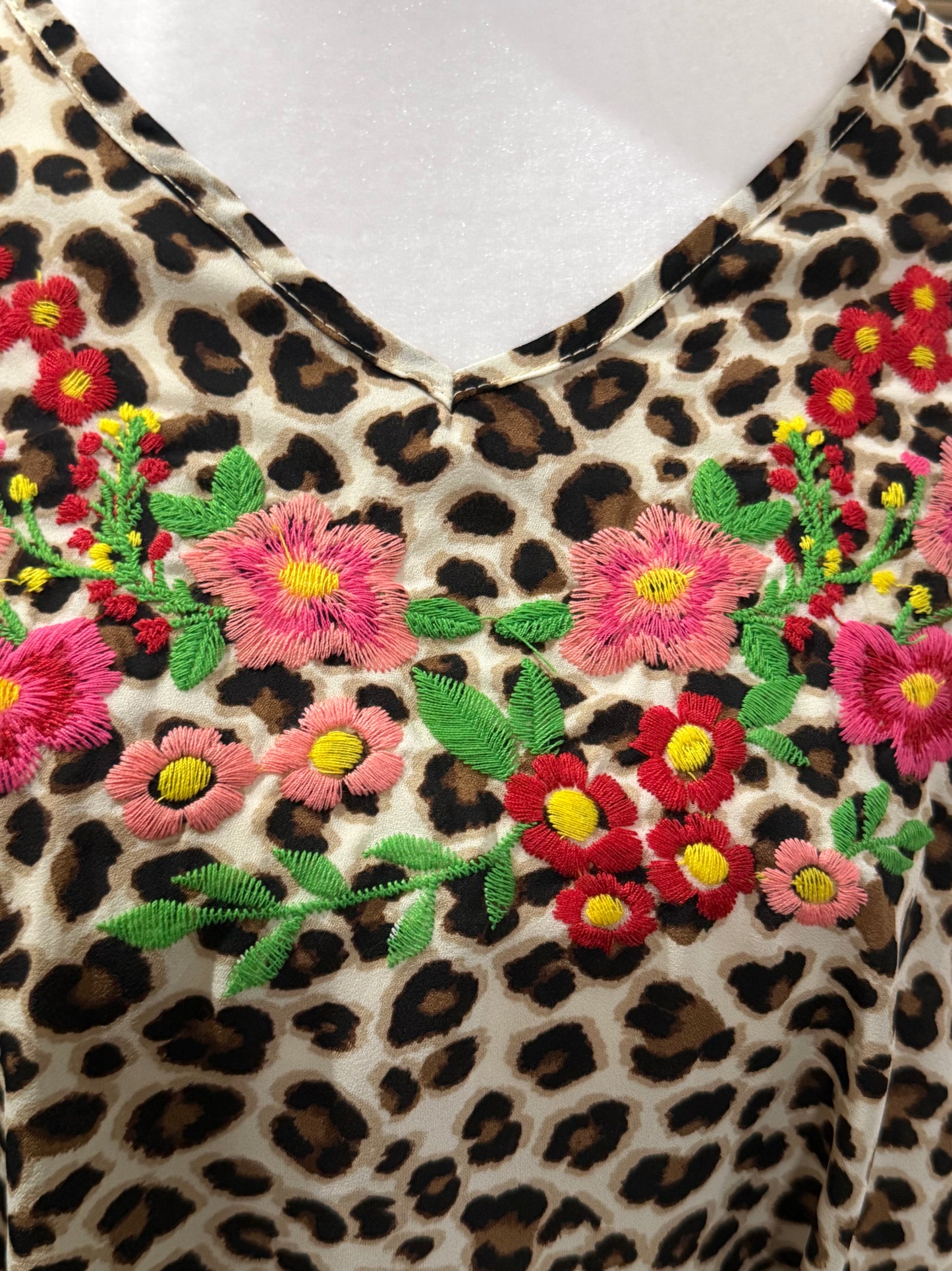Cheetah print blouse with floral embroidery