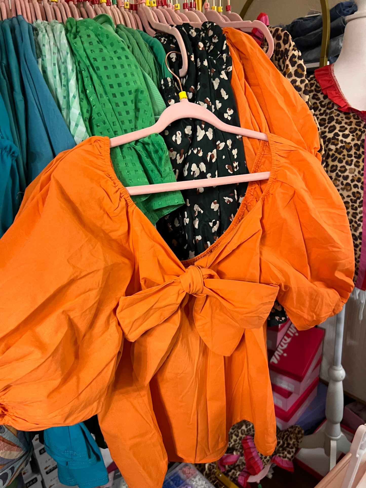 Orange puff sleeve blouse with bow back