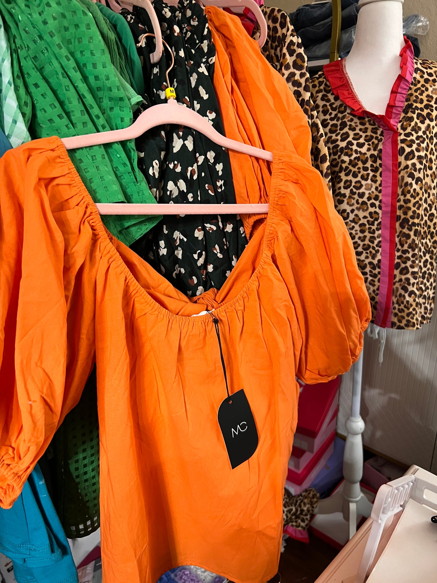 Orange puff sleeve blouse with bow back