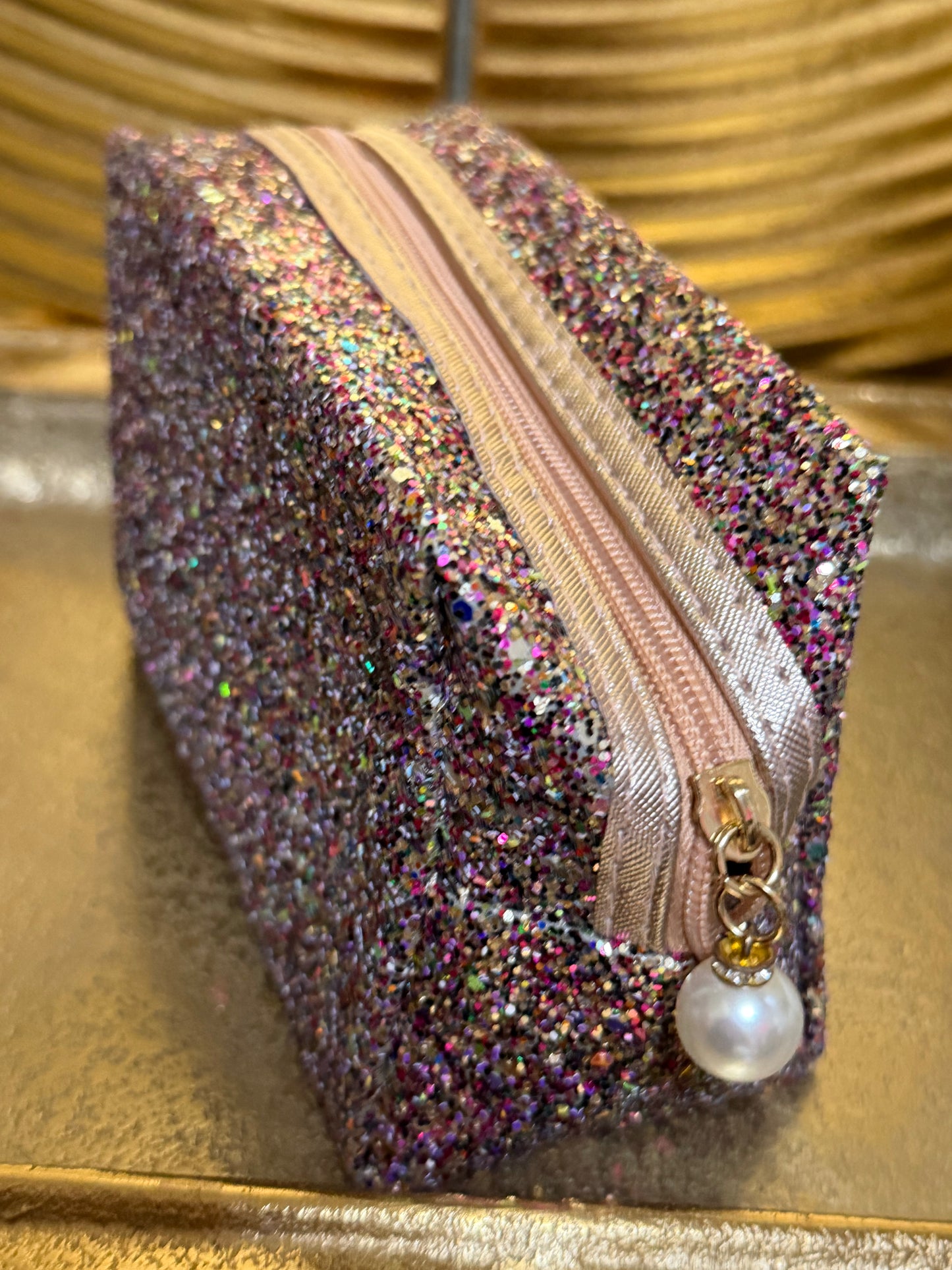 Rose Gold multi colored glitter cosmetic bag with faux accent pearl